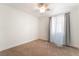 Well-lit, neutral bedroom with carpet and large window at 4360 Meadowlark Wing Way, North Las Vegas, NV 89084