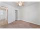 Carpeted bedroom with closet and overhead lighting at 4360 Meadowlark Wing Way, North Las Vegas, NV 89084