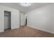 Bright bedroom with closet and adjacent bathroom entrance at 4360 Meadowlark Wing Way, North Las Vegas, NV 89084