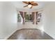 Cozy breakfast nook with large windows and wood-look tile flooring at 4360 Meadowlark Wing Way, North Las Vegas, NV 89084