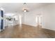 Bright and airy living room with an open floor plan connecting to other living spaces at 4360 Meadowlark Wing Way, North Las Vegas, NV 89084