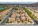 Birds-eye view showcasing the community layout with modern homes, landscaping, and streetscape at 5774 Typecast Rd, Las Vegas, NV 89142