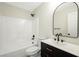 Tastefully appointed bathroom with a tub/shower combo and vanity at 5774 Typecast Rd, Las Vegas, NV 89142
