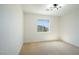 Bright bedroom with neutral carpet and simple design at 5774 Typecast Rd, Las Vegas, NV 89142