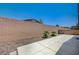 Fenced backyard offers privacy with minimal landscaping at 7822 Whitlocks Mill Ave, Las Vegas, NV 89147
