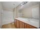 Bathroom featuring a vanity, shower, and tile floors at 7822 Whitlocks Mill Ave, Las Vegas, NV 89147