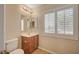 Bathroom features include shuttered windows, a vanity, and a toilet at 7822 Whitlocks Mill Ave, Las Vegas, NV 89147