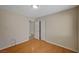 Bedroom featuring wood floors, closet and base molding at 7822 Whitlocks Mill Ave, Las Vegas, NV 89147