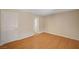 Comfortable bedroom with wood-look floors and closet at 7822 Whitlocks Mill Ave, Las Vegas, NV 89147