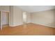 Spacious primary bedroom with wood floors, neutral walls, and ensuite bath access at 7822 Whitlocks Mill Ave, Las Vegas, NV 89147