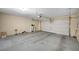 Spacious two-car garage with finished floor and garage door opener at 7822 Whitlocks Mill Ave, Las Vegas, NV 89147