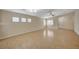Spacious living room with tile floors, plenty of natural light, and a view of the open concept floorplan at 7822 Whitlocks Mill Ave, Las Vegas, NV 89147