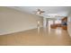 Bright living room with tile flooring throughout shows natural light and entryways at 7822 Whitlocks Mill Ave, Las Vegas, NV 89147