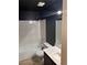 Well-lit bathroom featuring a tub-shower, vanity, and modern fixtures at 921 Sulphur Springs Ln # 201, Las Vegas, NV 89128