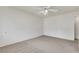 Spacious bedroom with neutral carpet, and a ceiling fan at 921 Sulphur Springs Ln # 201, Las Vegas, NV 89128