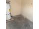 A room featuring a hot water heater and concrete flooring at 921 Sulphur Springs Ln # 201, Las Vegas, NV 89128