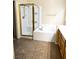 Bathroom with separate tub and shower boasting lots of counter space at 9324 Pitching Wedge Dr, Las Vegas, NV 89134