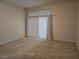 Cozy bedroom with neutral walls and window to the rear exterior for lots of light at 9324 Pitching Wedge Dr, Las Vegas, NV 89134