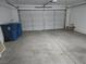 A spacious two-car garage with an automatic garage door at 9324 Pitching Wedge Dr, Las Vegas, NV 89134