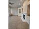 Inviting living room featuring tile flooring, fireplace with custom shelving, and recessed lighting at 9324 Pitching Wedge Dr, Las Vegas, NV 89134