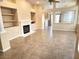 Open living room with tile flooring, fireplace, and recessed lighting for a spacious feel at 9324 Pitching Wedge Dr, Las Vegas, NV 89134