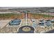 An aerial view showcasing the community park including sports fields, playgrounds, and landscaping at 2742 Zazzera Ct, Henderson, NV 89044