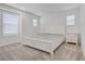Spacious bedroom with natural light, plush carpeting, and classic furnishings, offers a relaxing atmosphere at 2742 Zazzera Ct, Henderson, NV 89044