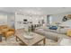 Open floor plan with kitchen island, living area, and dining table at 2742 Zazzera Ct, Henderson, NV 89044