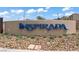 The Inspirada community sign featuring blue lettering set against a beige background with decorative landscaping at 2742 Zazzera Ct, Henderson, NV 89044