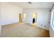 Neutral bedroom shows views to the closet and bathroom at 3523 Calf Roper Ct, North Las Vegas, NV 89032