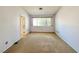 Empty bedroom shows view to closet at 3523 Calf Roper Ct, North Las Vegas, NV 89032