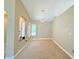 Bright dining area with decorative lighting and views of the front yard at 3523 Calf Roper Ct, North Las Vegas, NV 89032