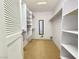 Spacious walk-in closet with built-in shelving and ample storage space at 3523 Calf Roper Ct, North Las Vegas, NV 89032