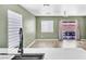 Bright living room with open patio view at 5332 Hadley Ct, North Las Vegas, NV 89031