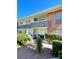 Charming condo exterior with a private patio, lush landscaping, and beautiful brick accents at 682 Oakmont Ave # 1507, Las Vegas, NV 89109