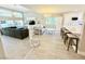 Spacious open-concept living room connected to the kitchen, perfect for entertaining at 7729 Natures Song St, Las Vegas, NV 89131