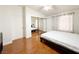 Spacious bedroom with mirrored closet and natural light at 8452 Boseck Dr # 225, Las Vegas, NV 89145