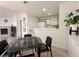 Bright dining room with modern decor shows the open floorplan at 8452 Boseck Dr # 225, Las Vegas, NV 89145