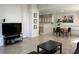 Open-concept layout features a dining area and kitchen in this brightly lit living room at 8452 Boseck Dr # 225, Las Vegas, NV 89145