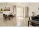 Open floor plan featuring the dining room, living room, and entrance to the home at 8452 Boseck Dr # 225, Las Vegas, NV 89145