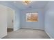 Bedroom featuring neutral walls, carpet flooring, a window with blinds, and a decorative ceiling fan at 9932 Keephills St, Las Vegas, NV 89183