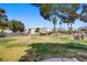 Large community greenspace with picnic tables at 9932 Keephills St, Las Vegas, NV 89183