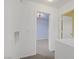 Upstairs hallway leading to bedrooms, with neutral walls and carpeted flooring at 9932 Keephills St, Las Vegas, NV 89183