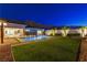 Expansive backyard with pool, spa and views of the surrounding mountains, great for entertaining at 10004 Terrastone Dr, Las Vegas, NV 89148