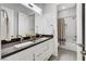 Bright bathroom with double sink vanity and tub/shower combo with stylish decor at 10004 Terrastone Dr, Las Vegas, NV 89148