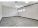 Garage with sealed floors, natural light, and ample space for storage and parking at 10004 Terrastone Dr, Las Vegas, NV 89148