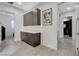Hallway with storage cabinets and white countertops, providing ample storage space at 10004 Terrastone Dr, Las Vegas, NV 89148