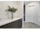Hallway featuring storage cabinets and white countertops, providing ample space at 10004 Terrastone Dr, Las Vegas, NV 89148