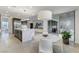 Open kitchen and breakfast nook, features a view of the patio and living room at 10004 Terrastone Dr, Las Vegas, NV 89148