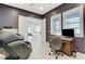 Office with a massage chair, ceiling fan, and bright natural light at 10004 Terrastone Dr, Las Vegas, NV 89148